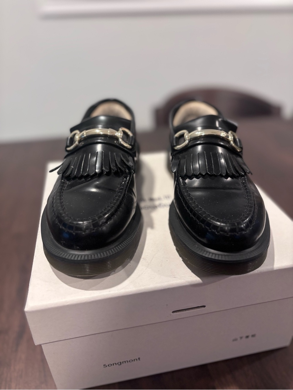 Dr. Martens Black Fringe Loafers with Silver Bit Detail